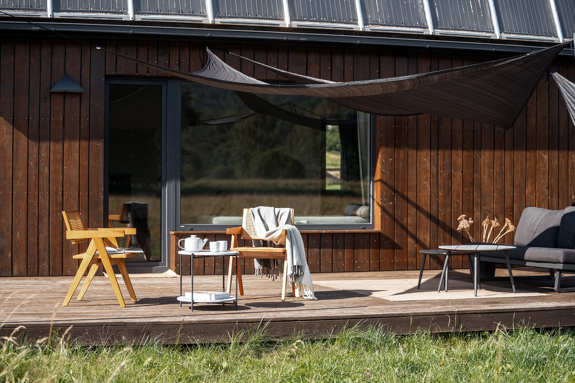 Residential,Building,In,Countryside.,Comfortable,Wooden,Lounge,Chairs,And,A