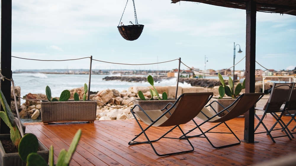 sling patio chairs for humid Carolina weather layout example