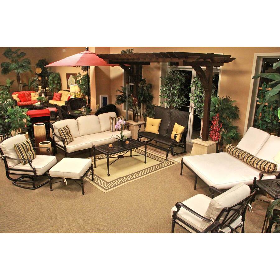 Dark frame patio lounge group with cream outdoor cushions